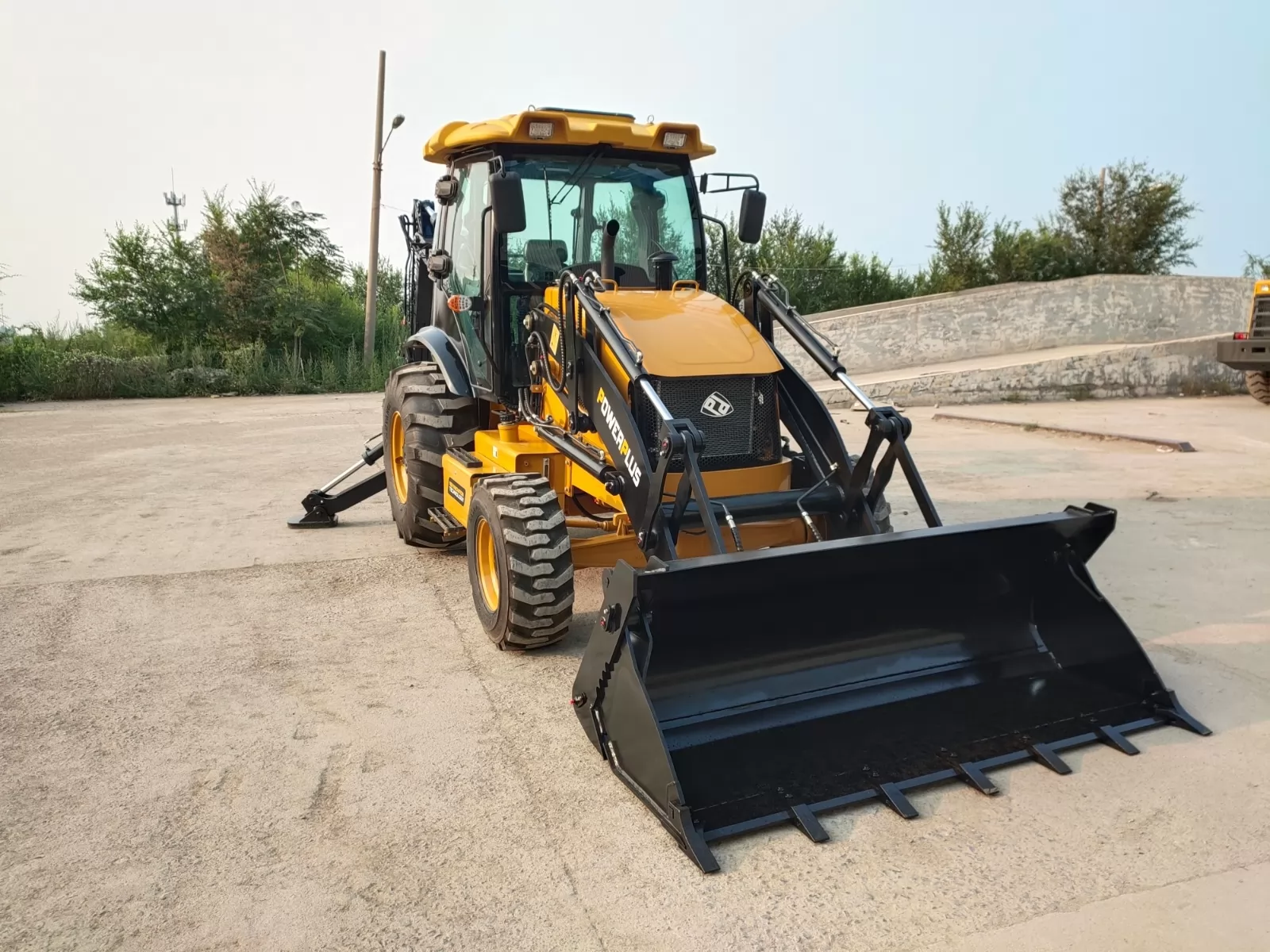 екскаватор навантажувач купити