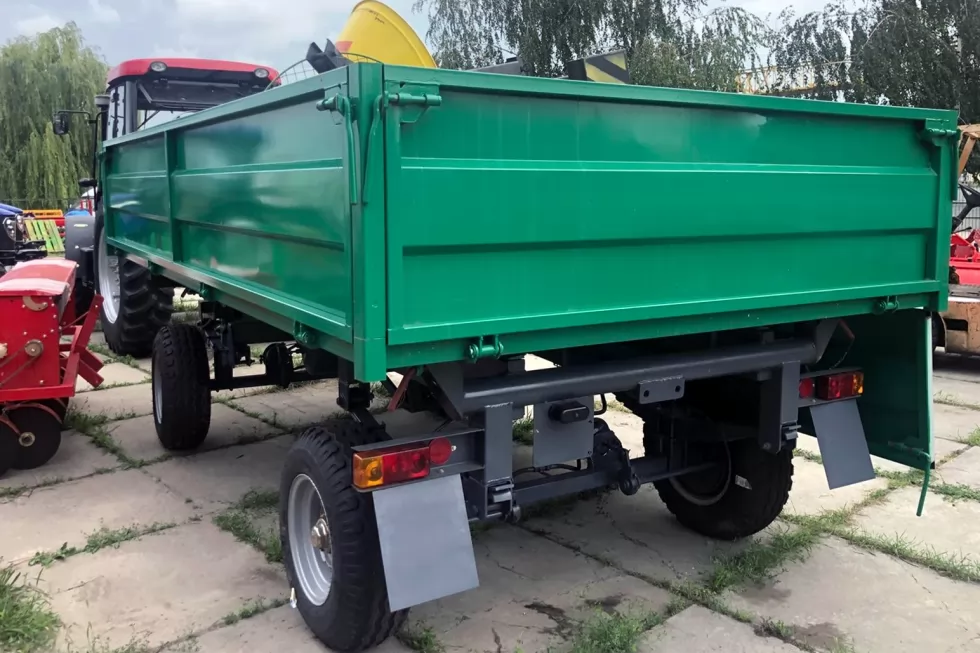 Отгрузили столичным коммунальщикам трактор с прицепом и навесным оборудованием, фото 4