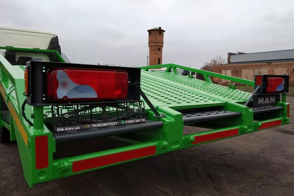 На базі MAN TGL 12.190 4x2 BL CH виготовили новий евакуатор з висувними апарелями, фото 8